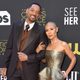 Jada Pinkett Smith and actor Will Smith arrive for the 27th Annual Critics Choice Awards at the Fairmont Century Plaza hotel in Los Angeles, March 13, 2022. (Photo by Valerie MACON / AFP) (Photo by VALERIE MACON/AFP via Getty Images)image caption